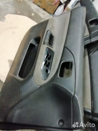 Обшивки дверные Mitsubishi Lancer 1.3 мт 2005 седа