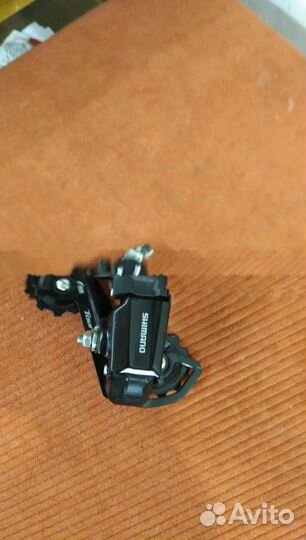 Переключатель Shimano TY200 3/6/7 скоростей