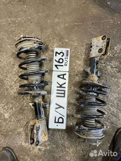 Стойка амортизатора передняя Renault Espace 4