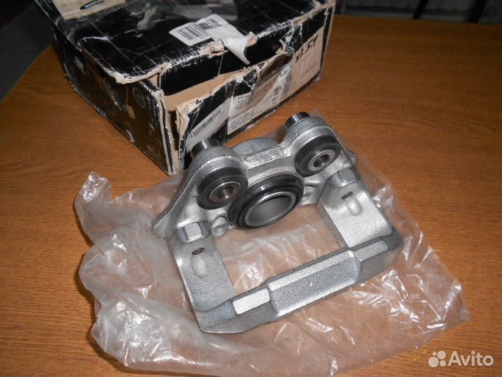 Opel Ascona/Kadett Суппорт передний правый Новый