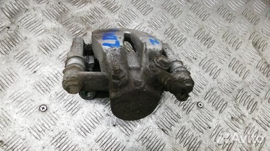 Суппорт тормозной задний левый toyota avensis T25