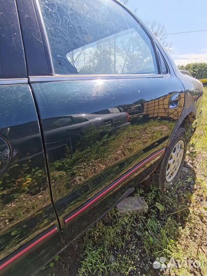 Дверь задняя левая kia clarus 2