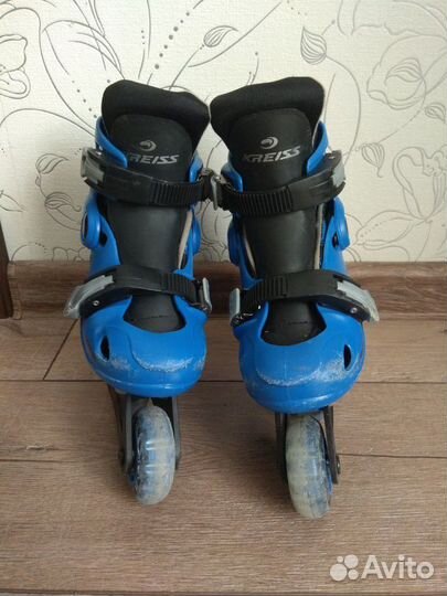 Роликовые коньки