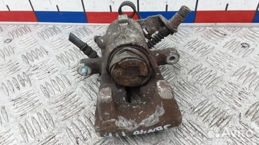 Суппорт тормозной задний правый opel zafira B (JDN