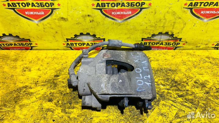 Суппорт передний левый Volkswagen Polo V 1.2