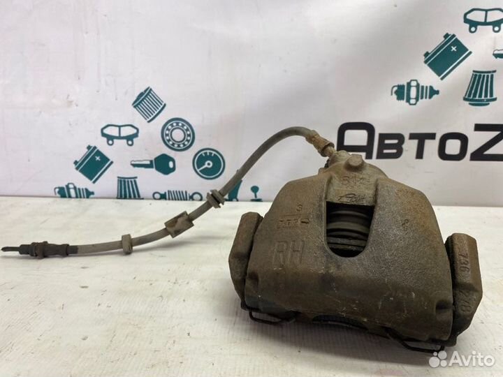 Суппорт тормозной передний правый Ford Focus седан