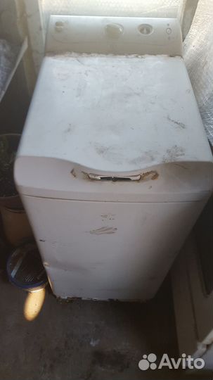 Стиральная машинка с вертикальной загрузкой