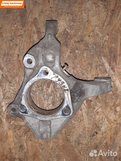 Кулак передний левый Chevrolet Cruze рест