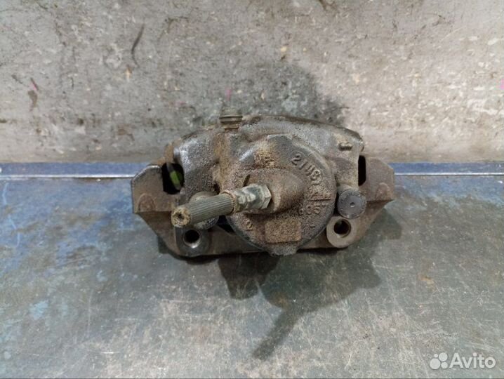 Суппорт передний Mazda Tribute EP