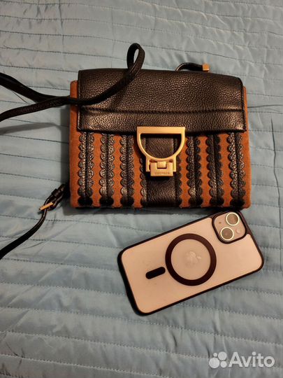 Сумка клатч coccinelle