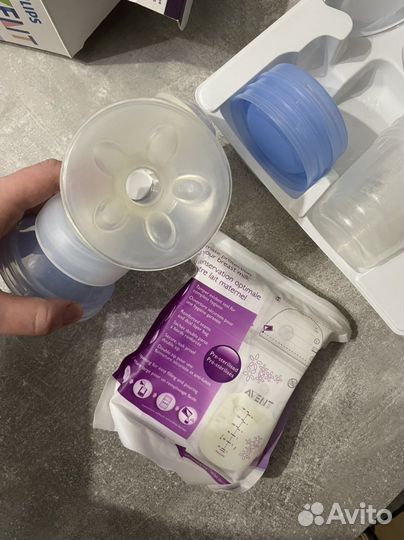 Молокоотсос ручной с контейнерами