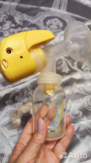 Молокоотсос medela электрический