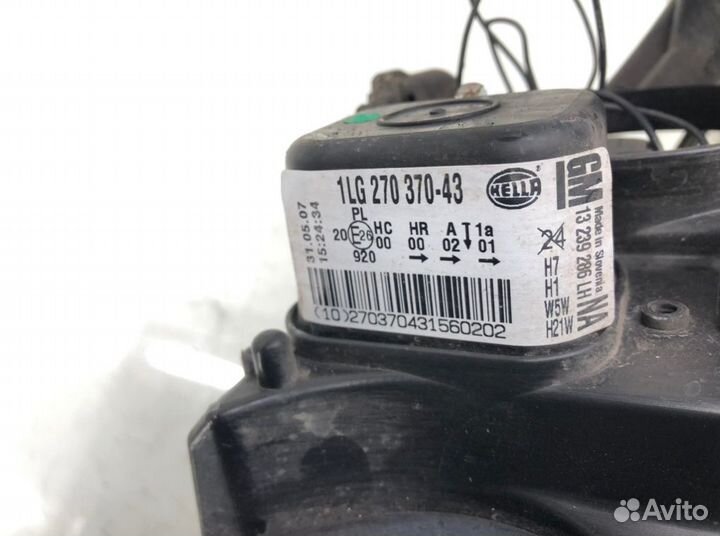 Фара 1LG27037043 Opel Astra H (2004-2010)