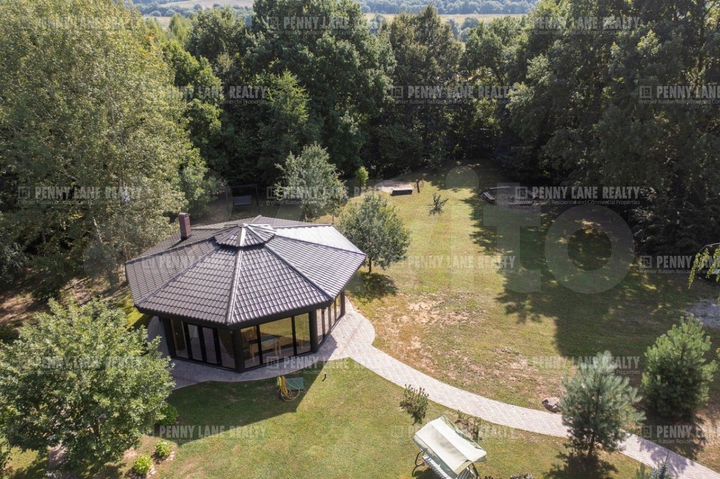 Коттедж 390 м² на участке 57 сот.