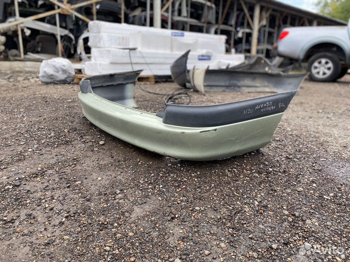 Бампер задний Toyota Avensis 1997г. (универсал)