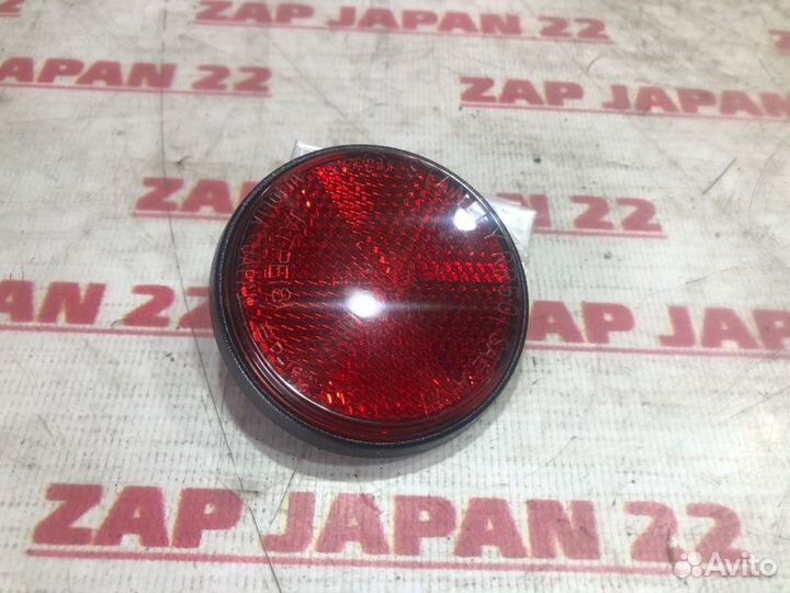 Отражатель в бампер задний Mitsubishi Challenger