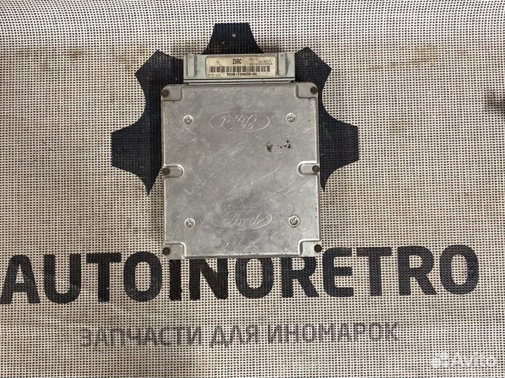 Блок управления двигателем Ford 92vb12a650ac