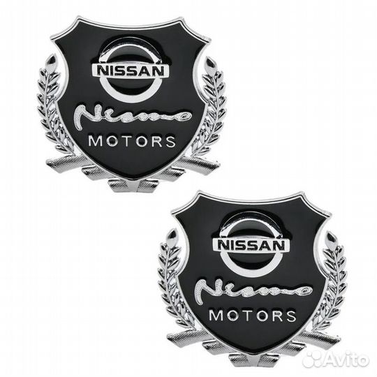 Шильдик Nissan Motors черный металл 55*50мм 2шт S