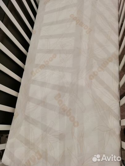 Детская кроватка с поперечным маятником