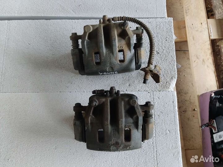 Суппорт тормозной передний Ssang Yong Kyron