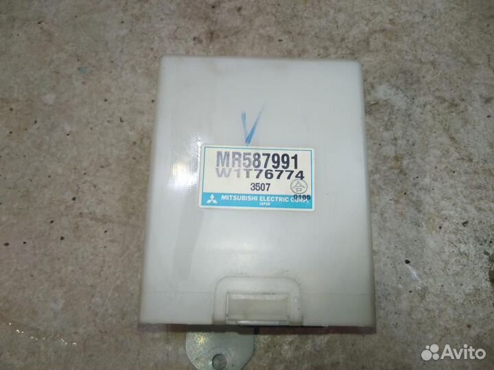 Блок управления подвеской Mitsubishi Grandis NA4W