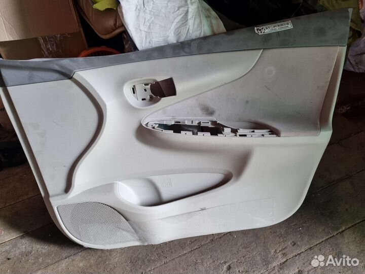 Дверные карты т.королла аксио 144