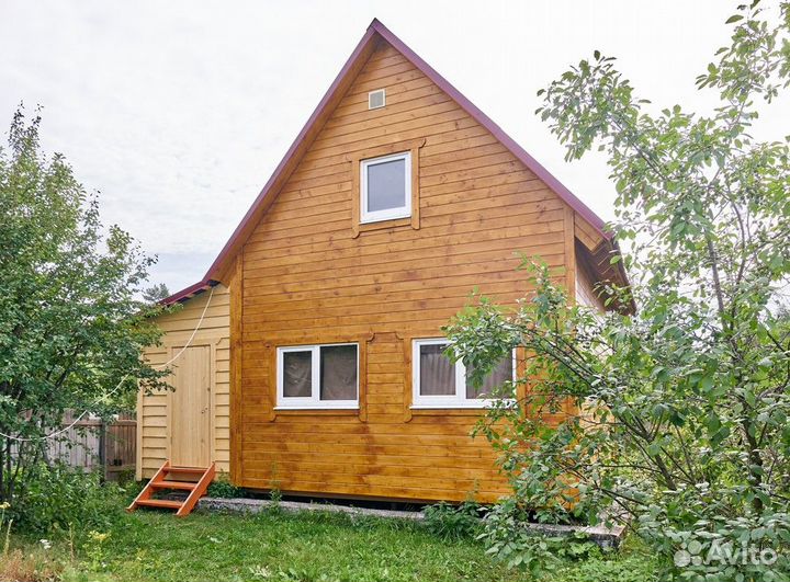 Каркасный дачный дом в стиле барнхаус