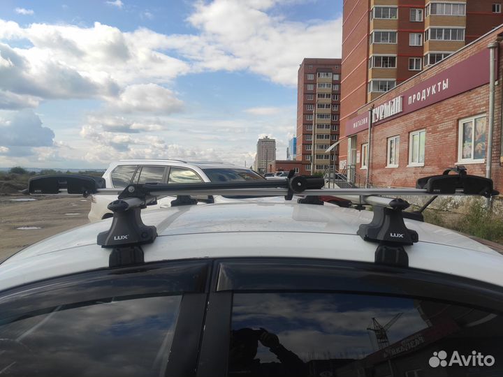 Велокрепление на крышу автомобиля