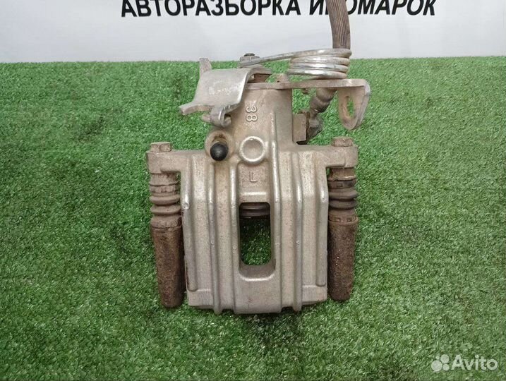Задний левый суппорт Volkswagen Passat B5