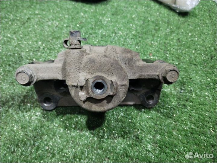 Суппорт тормозной передний левый Chevrolet Spark