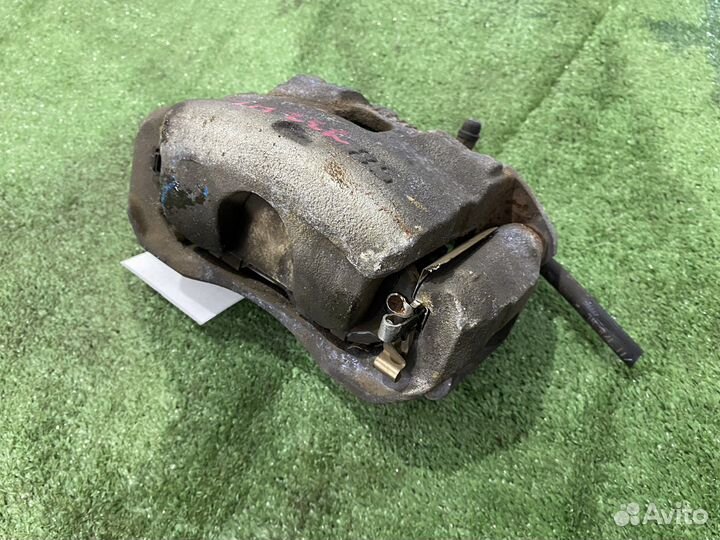 Суппорт тормозной передний левый Nissan Teana J32