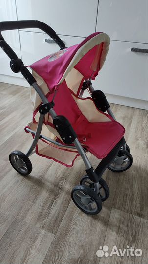 Игрушечная коляска для кукол