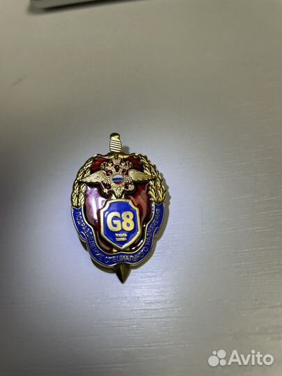 Значок серебро G8