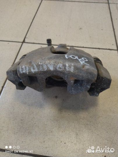 Суппорт тормозной передний правый Volkswagen Polo