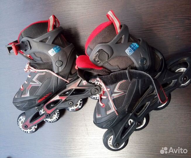 Роликовые коньки