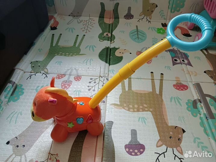 Музыкальная лошадка каталка