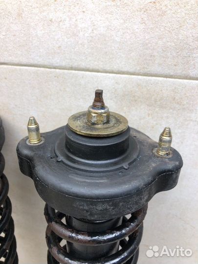 Амортизатор стойка задний Volvo V40 универсал