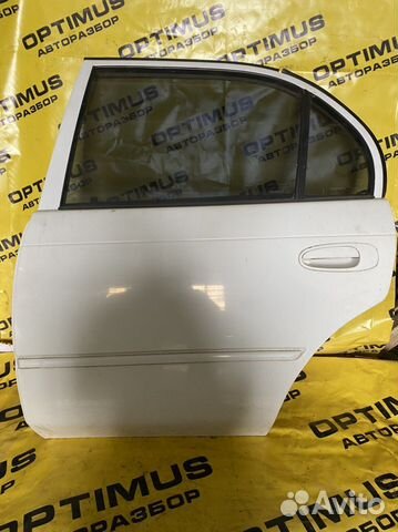 Задняя левая дверь Toyota Corolla E100