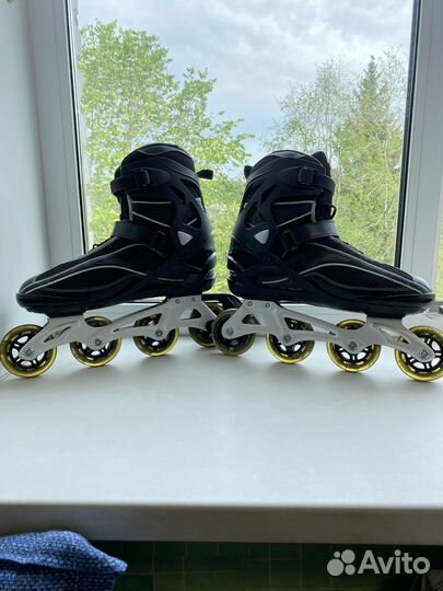 Роликовые коньки