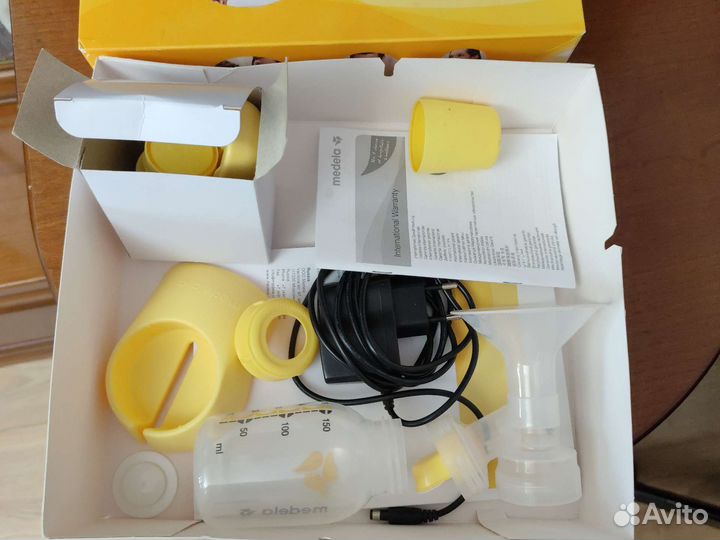 Молокоотсос medela электрический