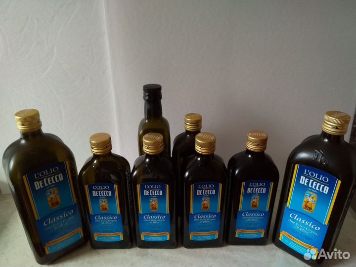 Бутылки стеклянные из-под оливкового масла