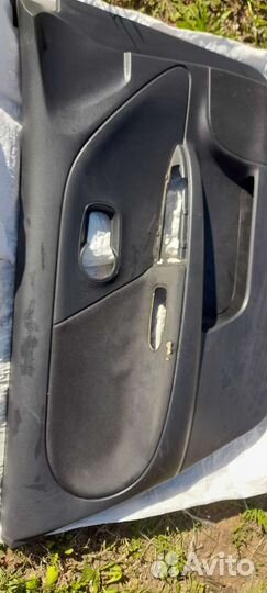 Обшивка двери Ниссан note