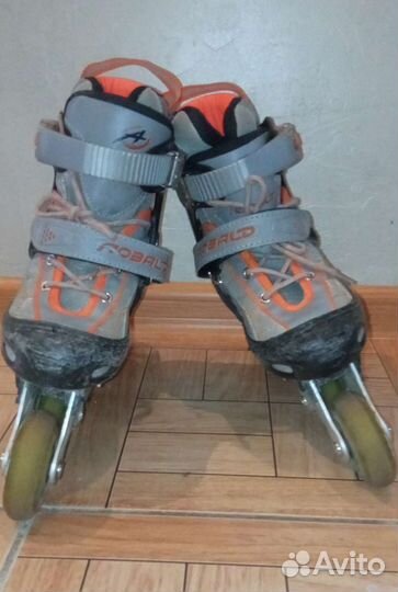 Роликовые коньки