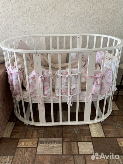 Детская кроватка-трансформер с маятником