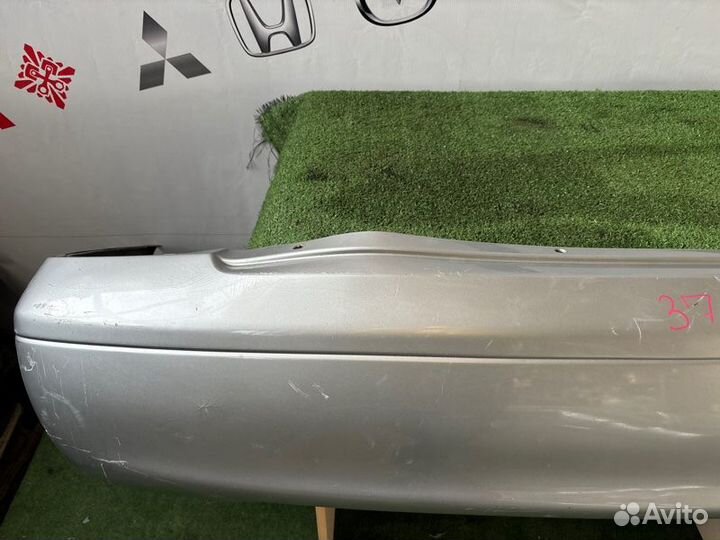 Бампер задний Nissan Sunny B15