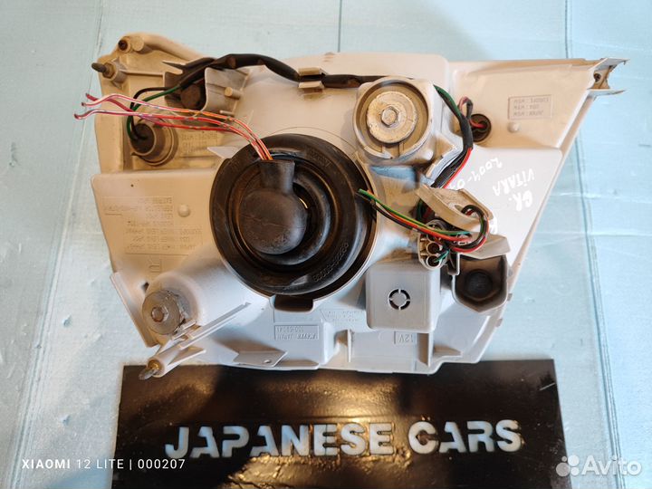 Фара сторона R Suzuki Grand Vitara