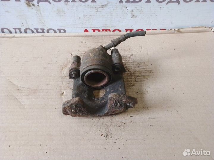 Суппорт тормозной передний левый Volkswagen Golf 3