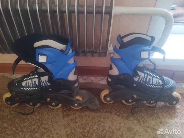 Роликовые коньки