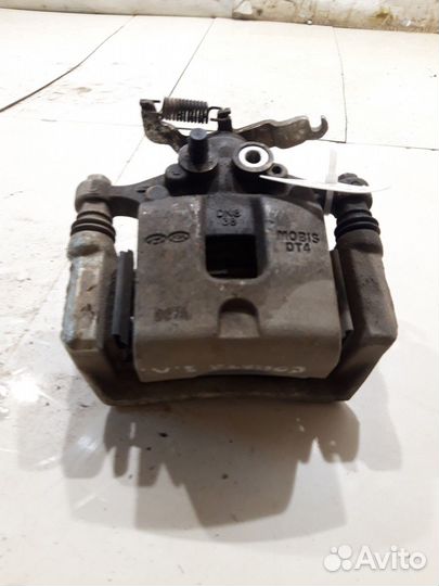 Суппорт(задний левый) (Hyundai Sonata viii DN8)