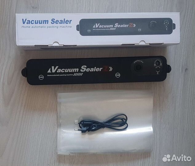 Вакууматор (вакуумный упаковщик) новый